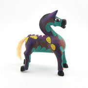 Colorful horse figurine with a white background