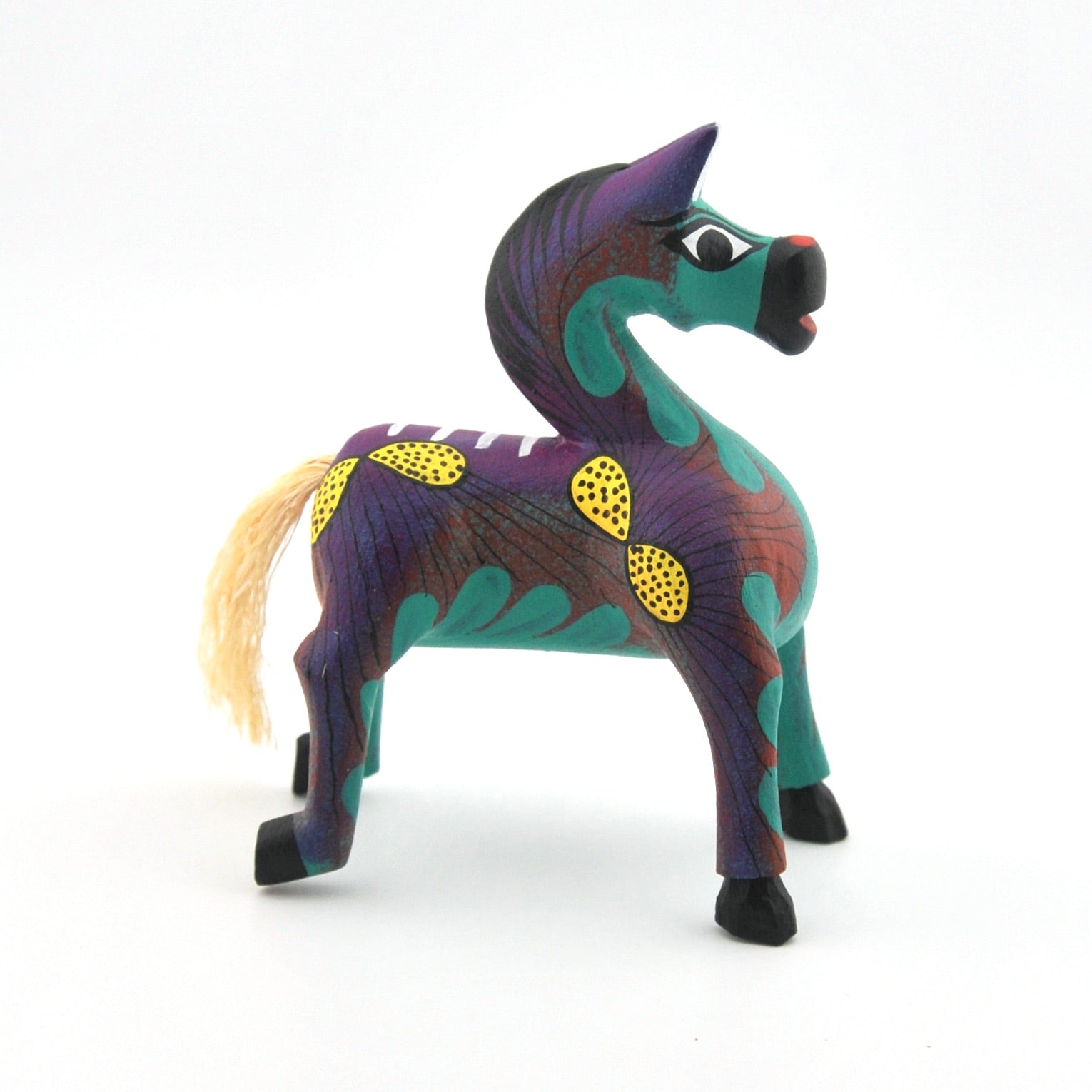 Colorful horse figurine with a white background