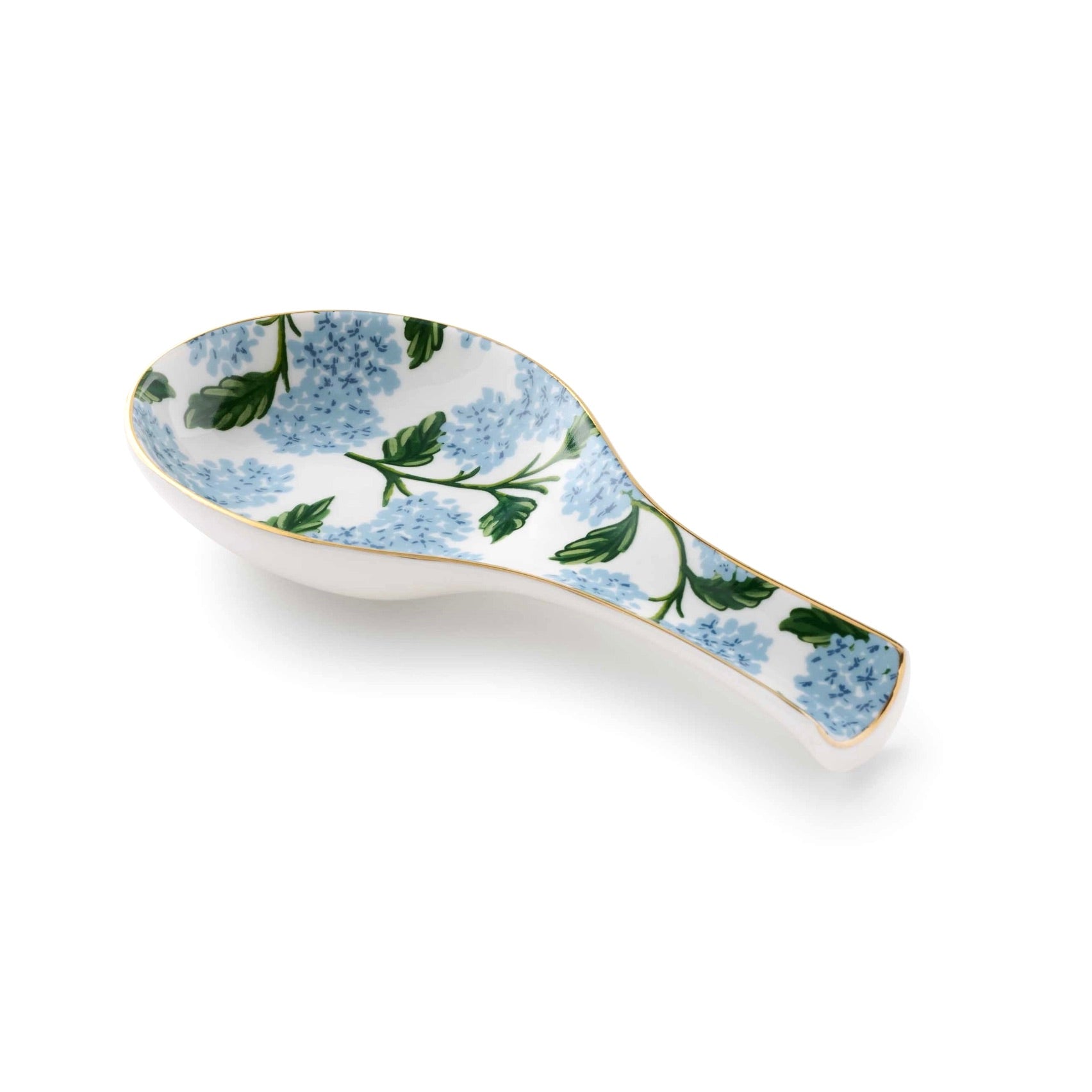 Decorative ceramic spoon rest with floral pattern on a white background