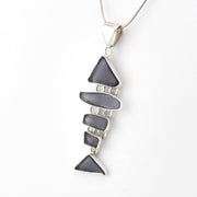 Necklace with a blue violet pendant on a white background