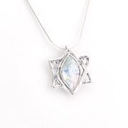 Silver pendant with Roman glass on a white background