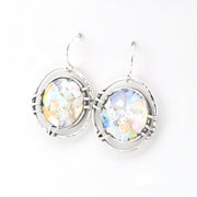 Silver earrings with multicolored glass on a white background