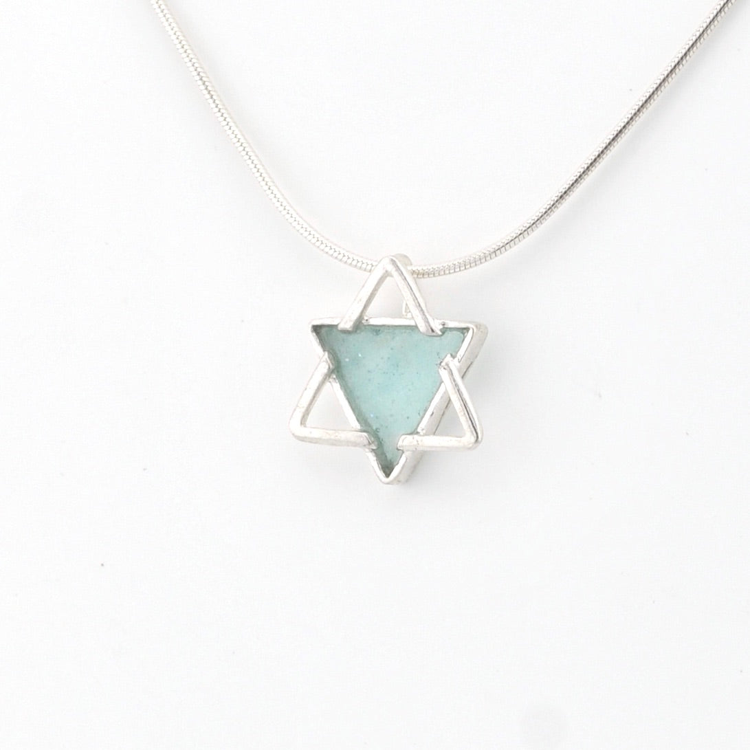 Necklace with a star-shaped pendant on a white background