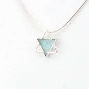 Necklace with a star-shaped pendant on a white background