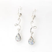 Silver teardrop earrings on a white background