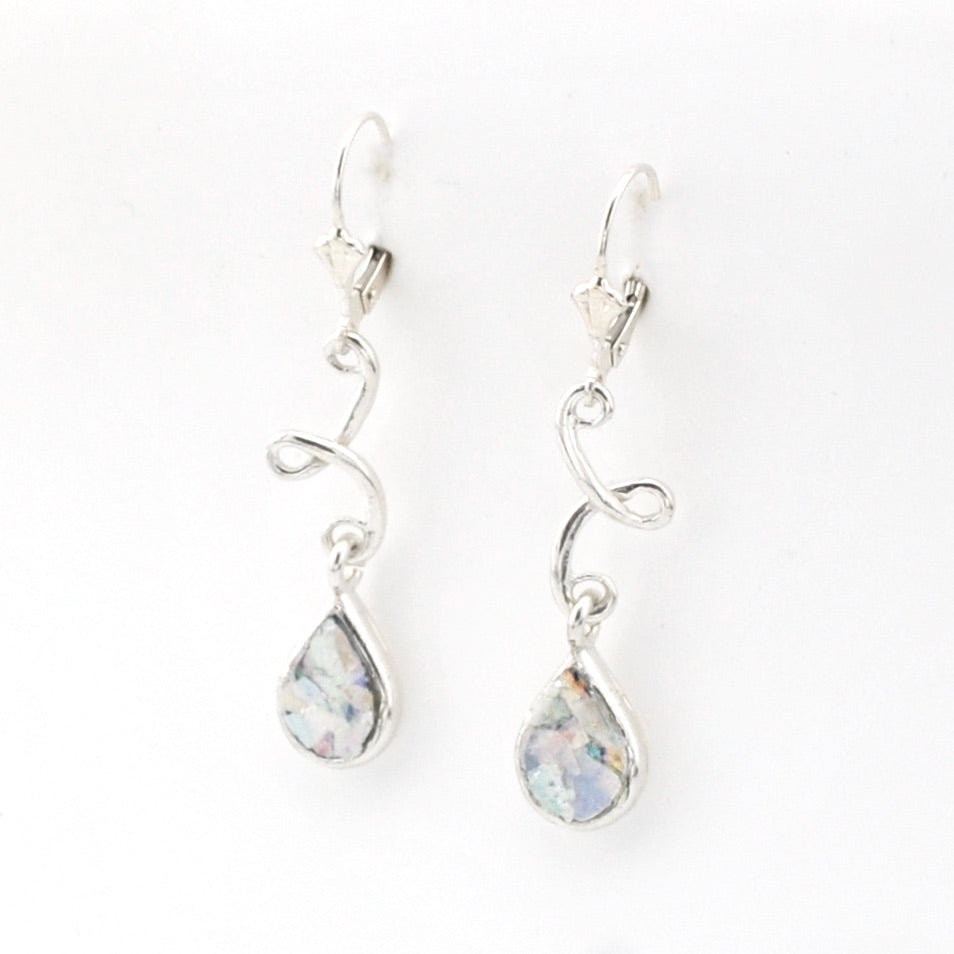 Silver teardrop earrings on a white background
