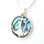 Silver pendant with abalone shell design on a white background