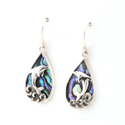Teardrop-shaped earrings with dolphin design on a white background