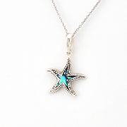 Starfish pendant necklace on a white background