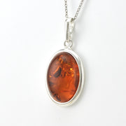 Side View Silver Amber Oval Necklace