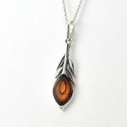 Side View Silver Amber Peacock Feather Necklace