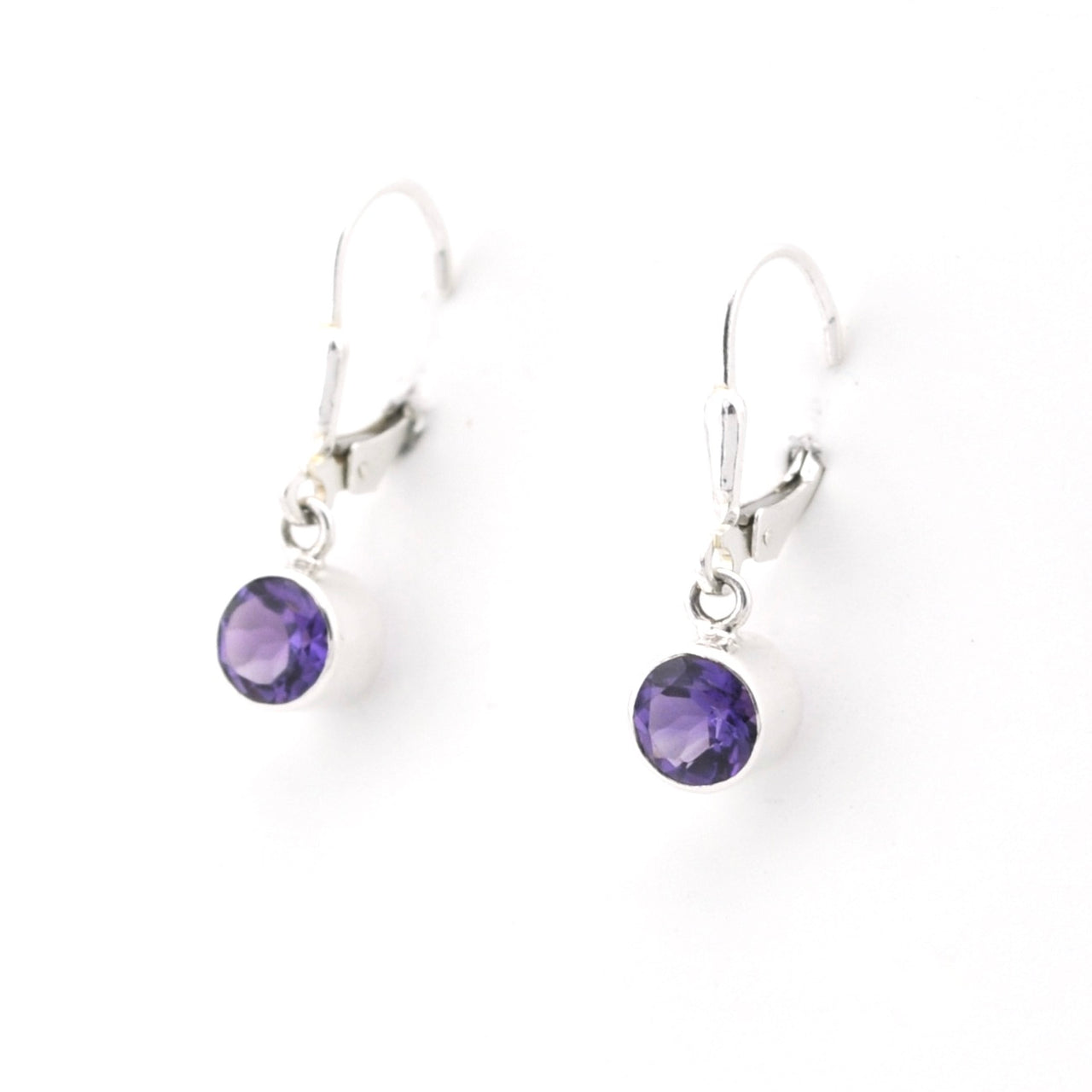 Pair of purple gemstone earrings on a white background