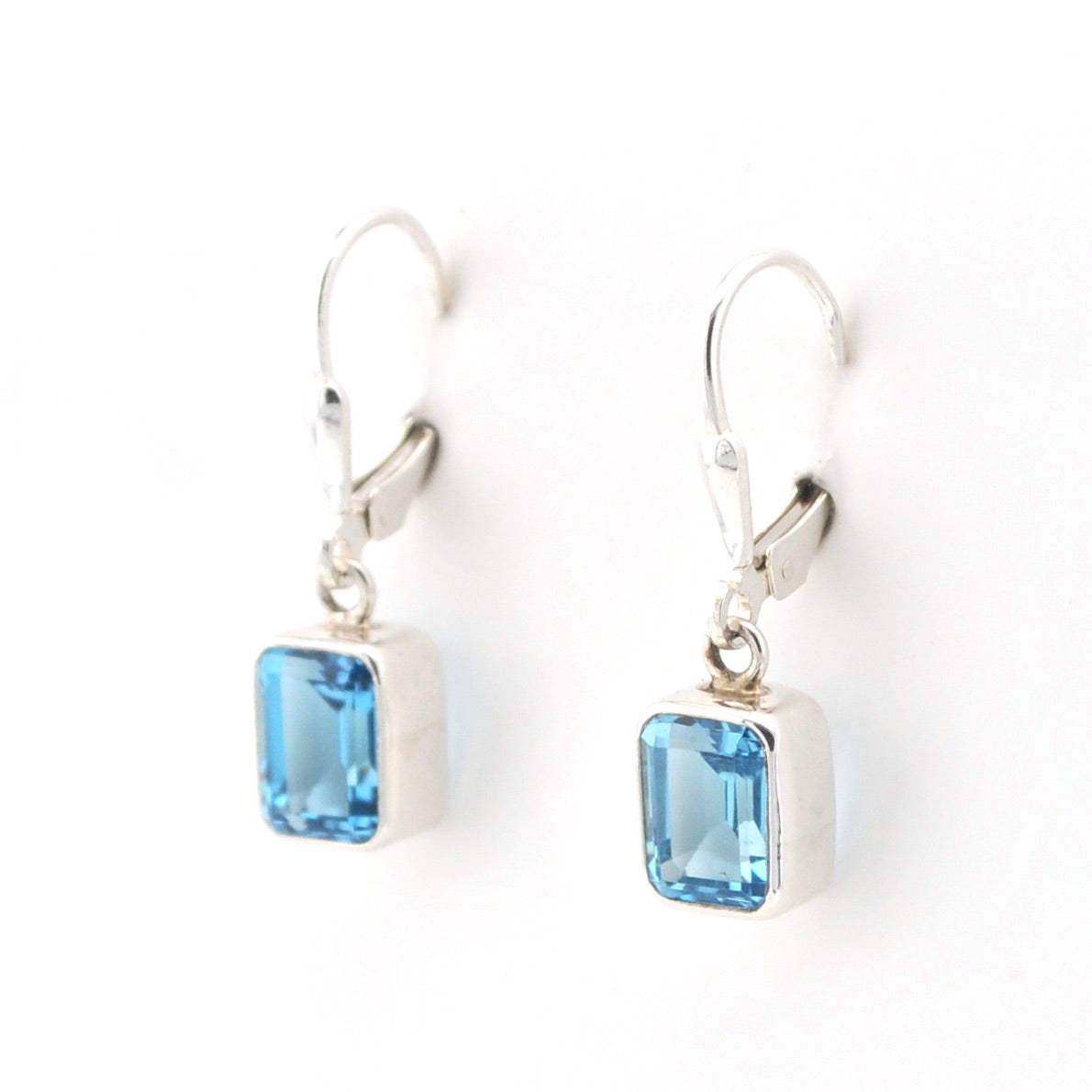 Side View Silver Blue Topaz 6x8mm Rectangle Dangle Earrings