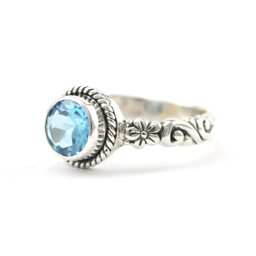 Side View Silver Blue Topaz 7mm Round Bali Scroll Ring
