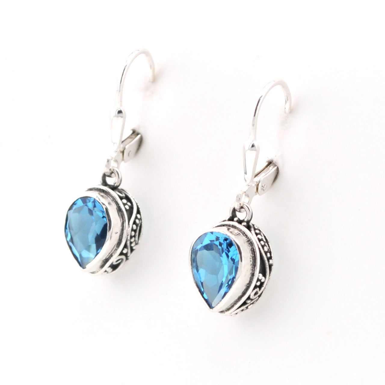 Side View Silver Blue Topaz 7x9mm Pear Bali Dangle Earrings