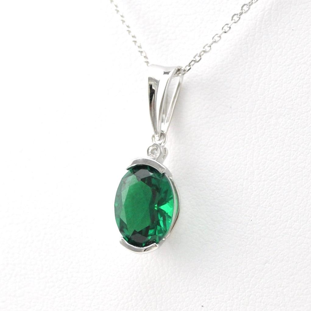 Side View Silver Created Emerald 2ct Oval CZ Necklace