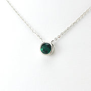 Side View Silver Created Emerald 2ct Round Necklace