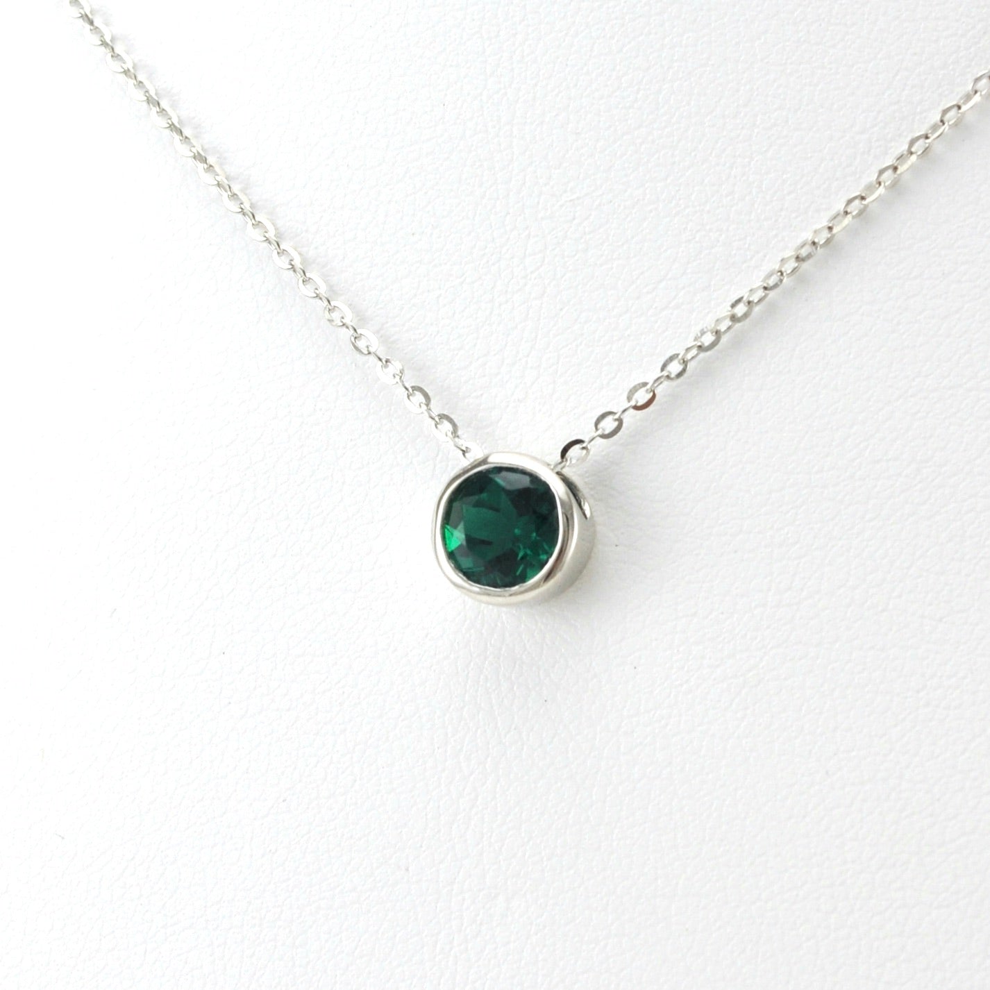 Side View Silver Created Emerald 2ct Round Necklace