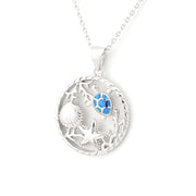 Silver necklace with a round pendant featuring a blue gemstone on a white background
