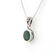 Side View Silver Emerald 5x7mm Oval Bali Necklace