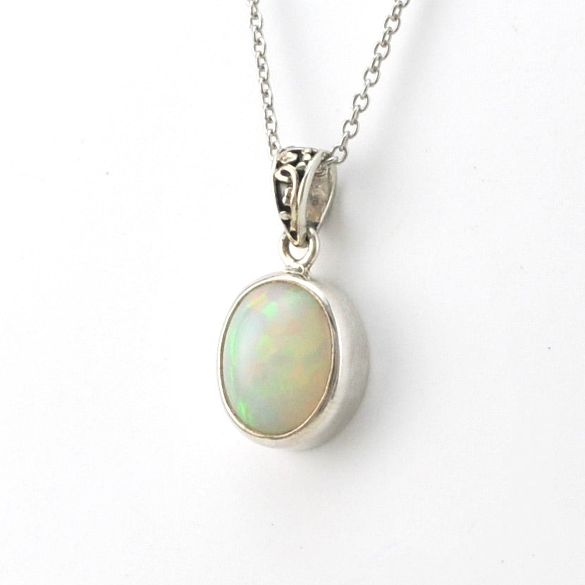 Side View Silver Ethiopian Opal 8x10mm Oval Necklace
