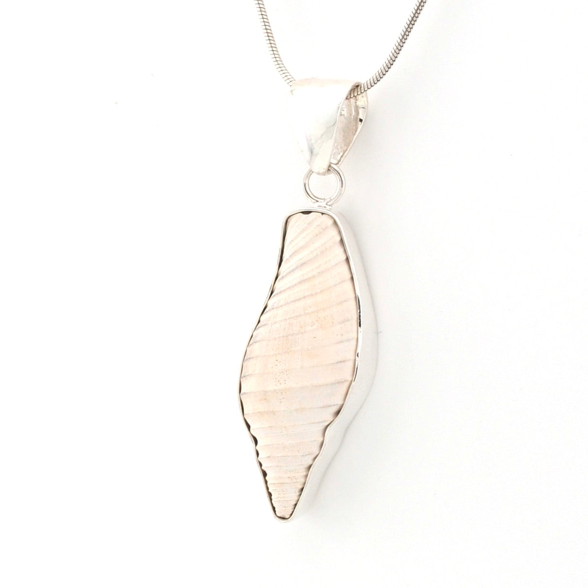 Silver pendant on a white background
