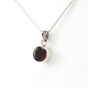Side View Silver Garnet 8mm Round Bali Necklace