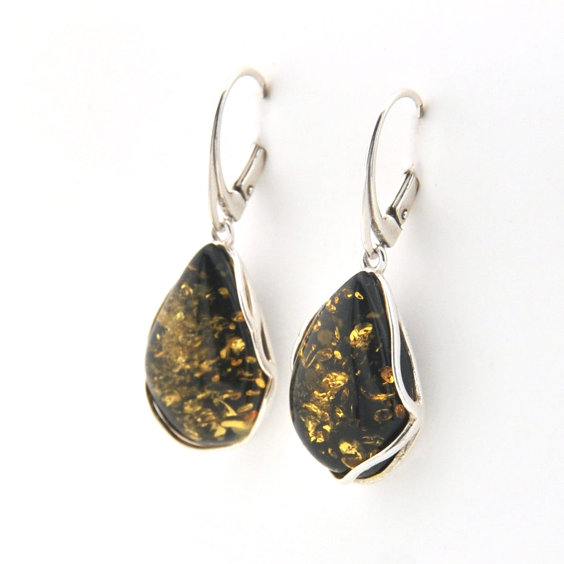 Teardrop-shaped earrings with black and gold speckled stones on a white background