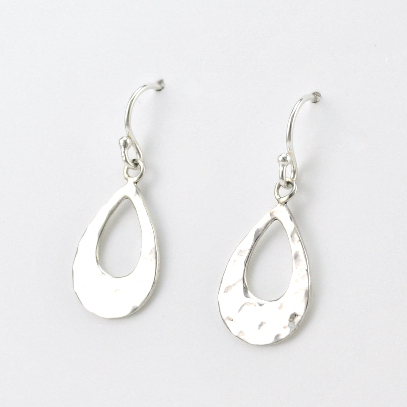 Side View Silver Hammered Teardrop Dangle Earrings