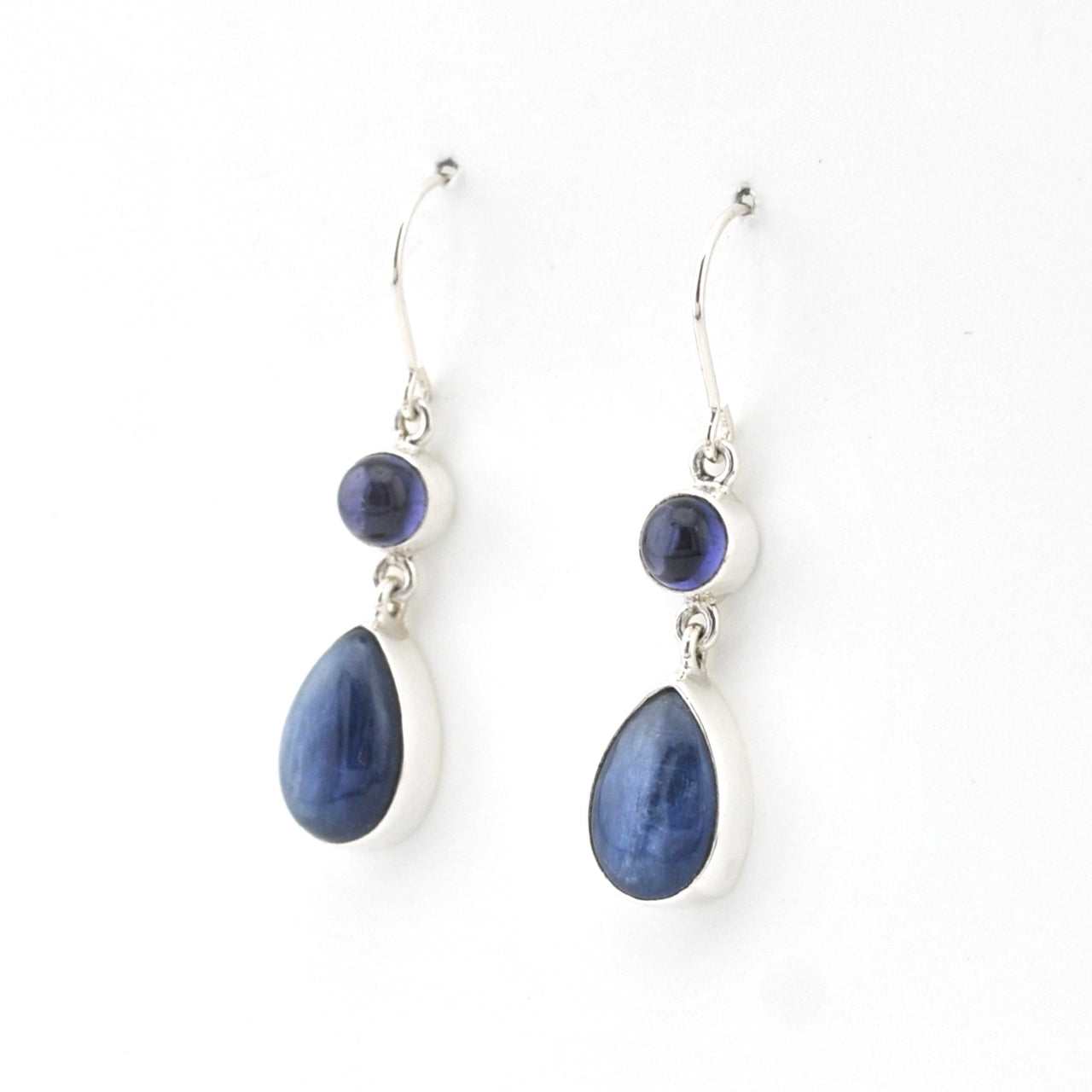 Pair of blue teardrop earrings on a white background