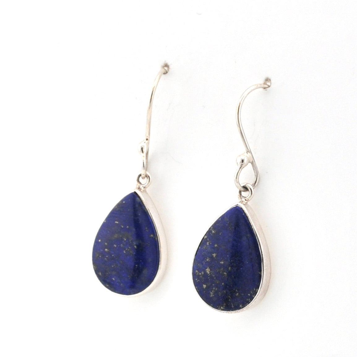 Teardrop-shaped blue earrings with silver hooks on a white background