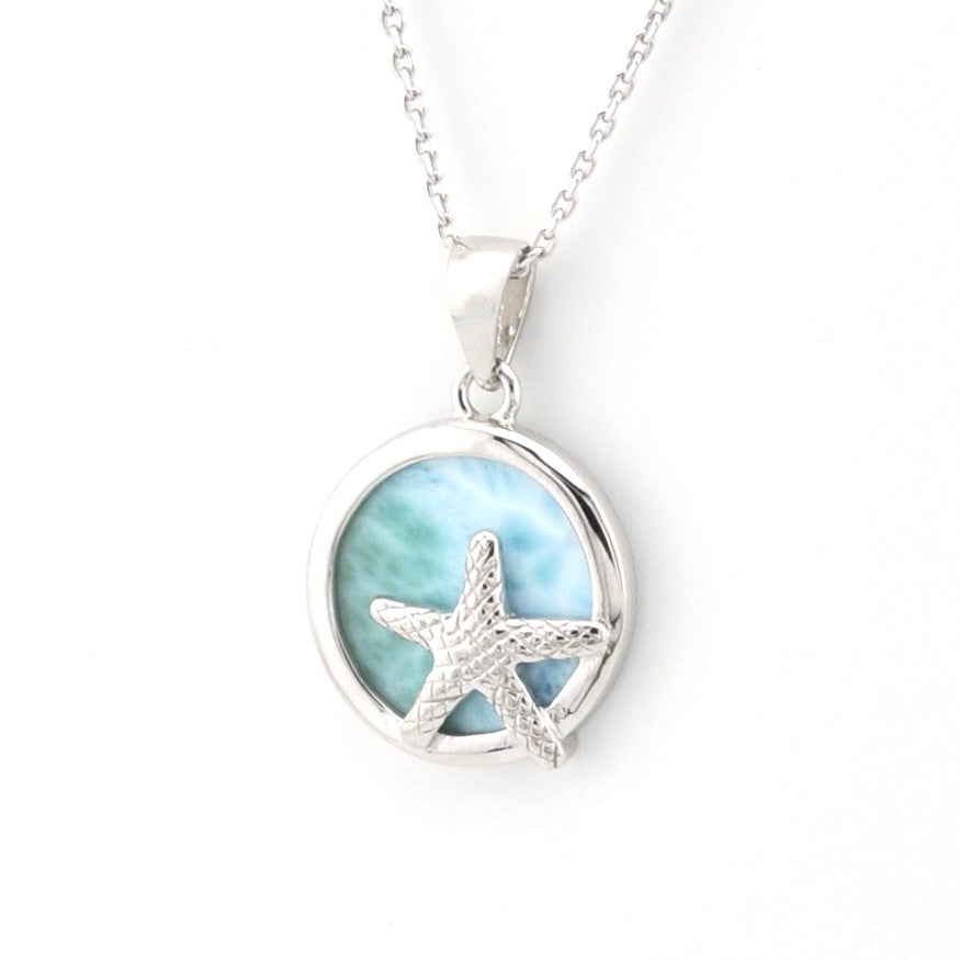 Silver necklace with a starfish pendant on a white background