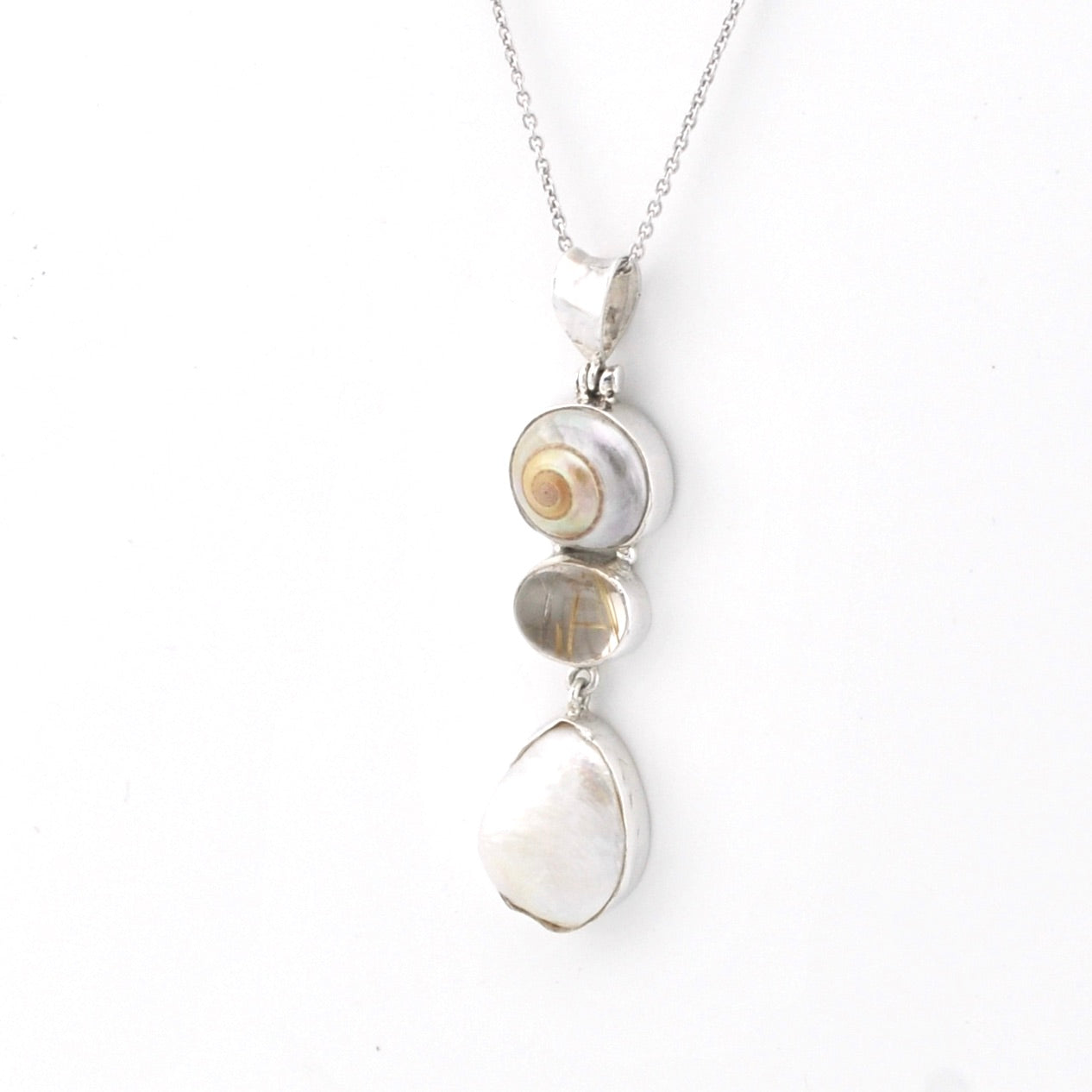 Silver necklace with three stone on a white background