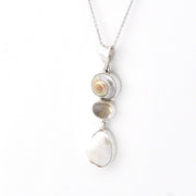 Silver necklace with three stone on a white background