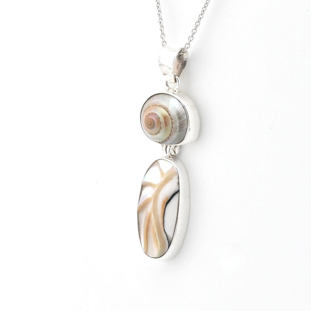 Necklace with a shell pendant on a white background