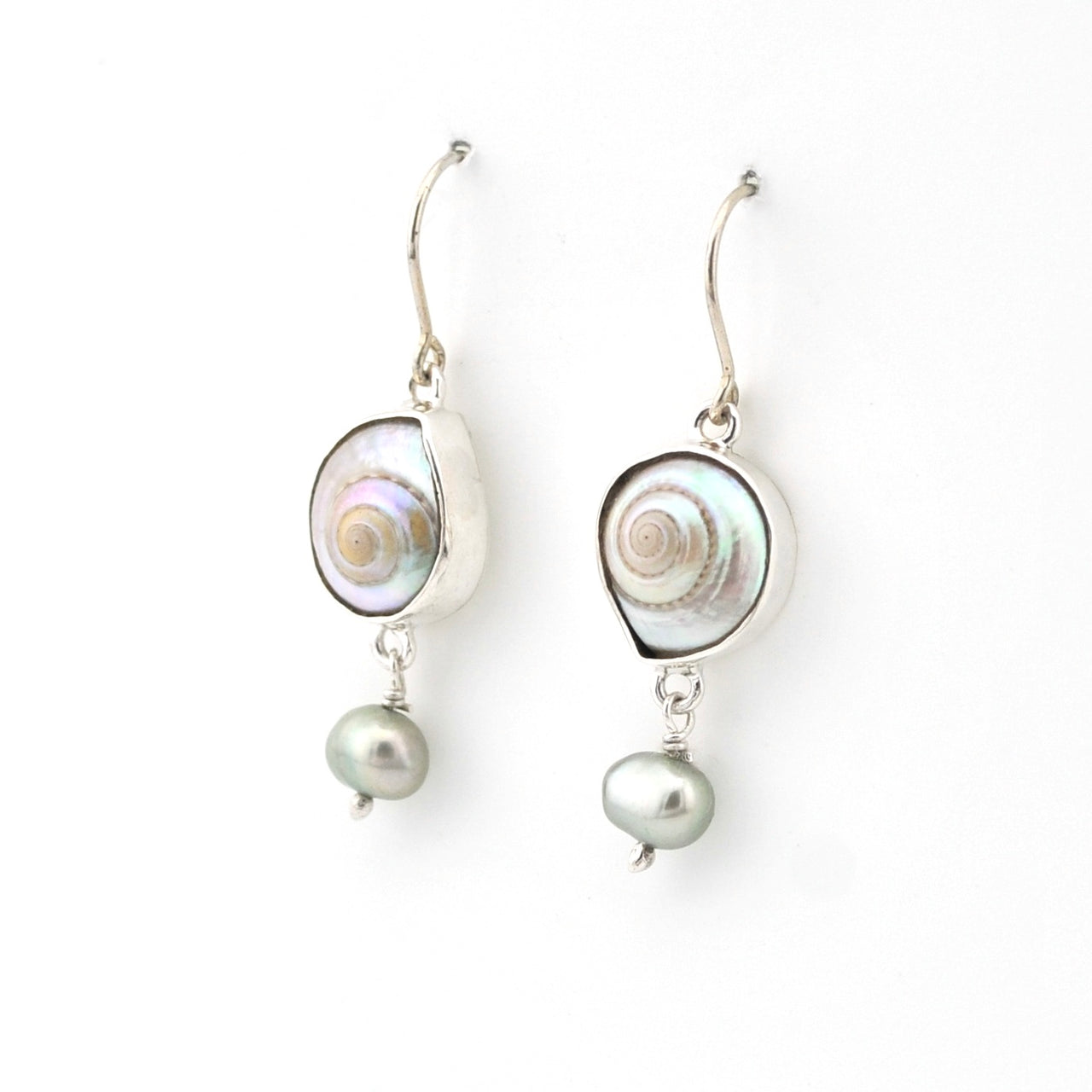 Pair of earrings with shell and pearl designs on a white background