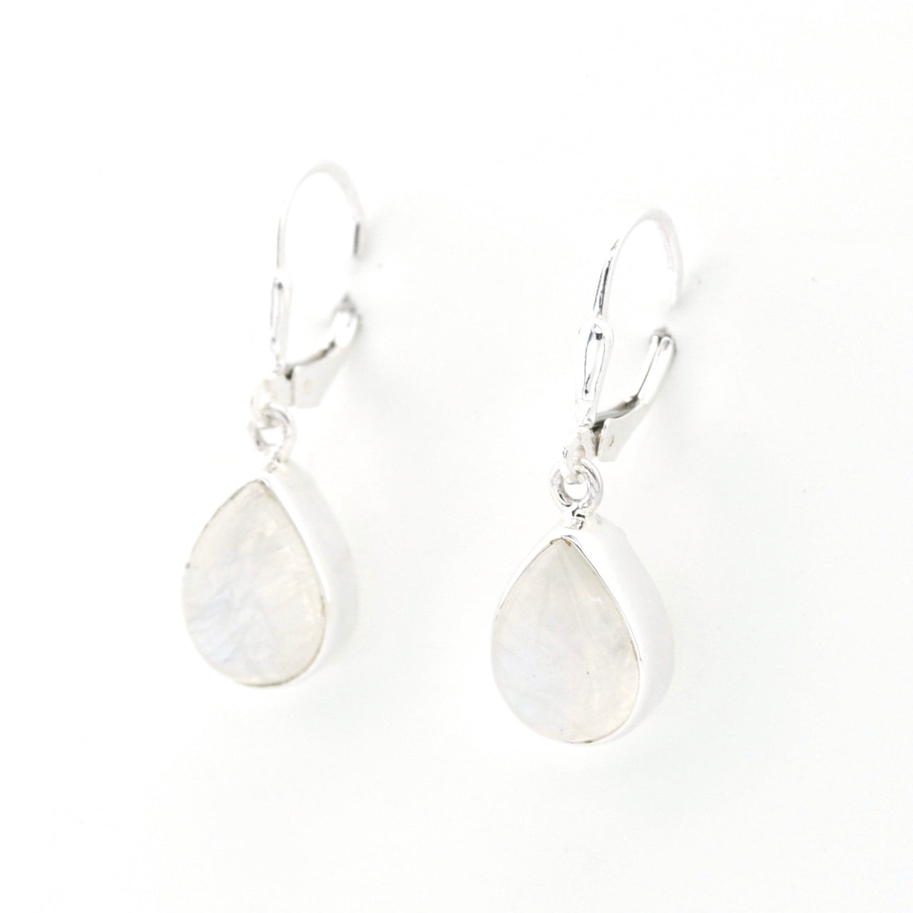 Silver teardrop earrings on a white background