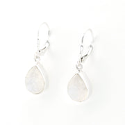Silver teardrop earrings on a white background