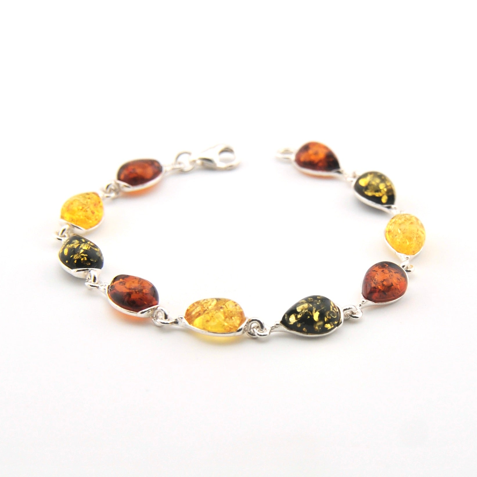Bracelet with amber stones on a white background