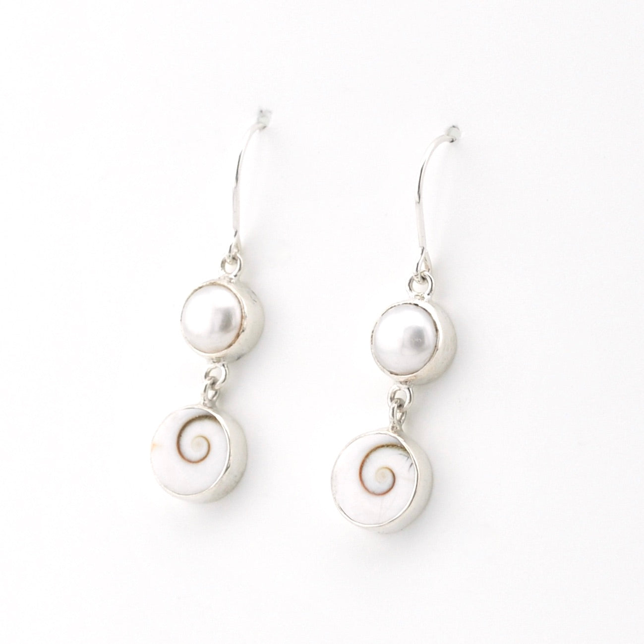 Silver Pearl Shiva Shell Earrings on white background