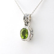 Side View Silver Peridot 7x9mm Oval Bali Scroll Necklace