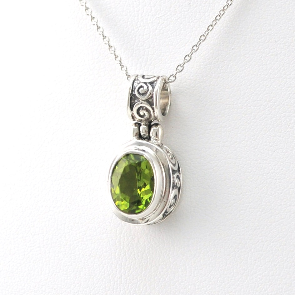 Side View Silver Peridot 7x9mm Oval Bali Scroll Necklace