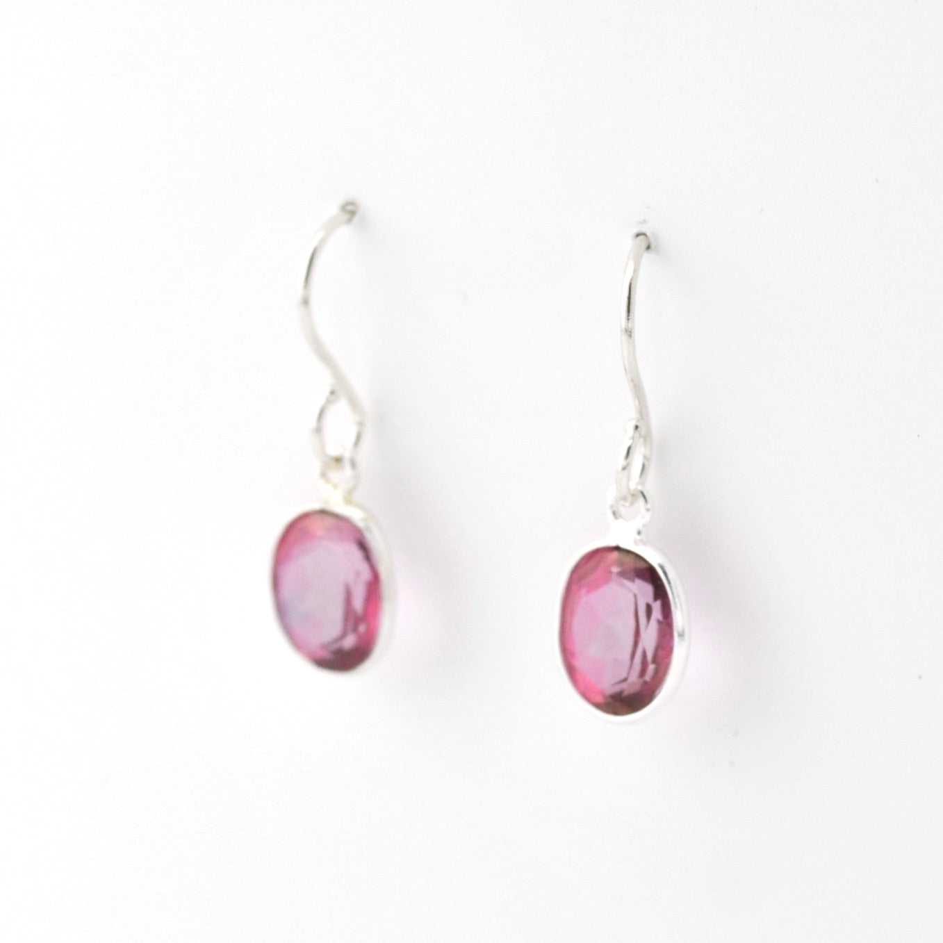 Side View Silver Pink Topaz Oval Bezel Dangles Earrings