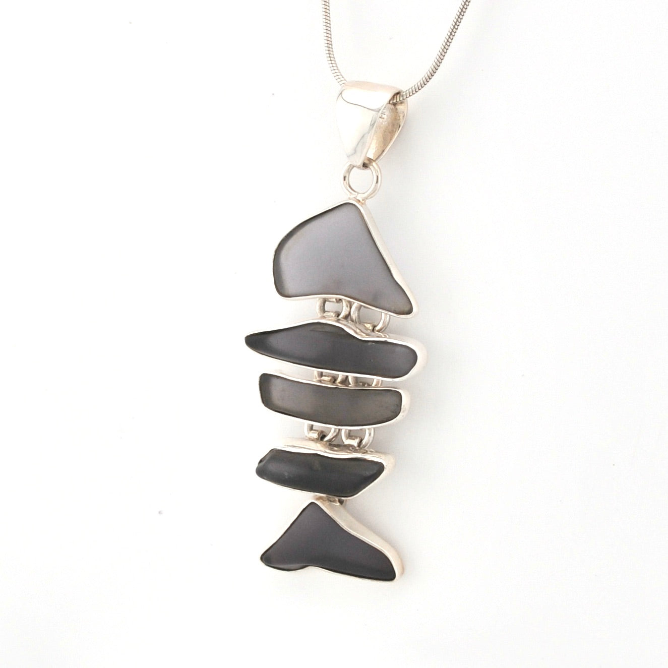 Necklace with a unique pendant on a white background