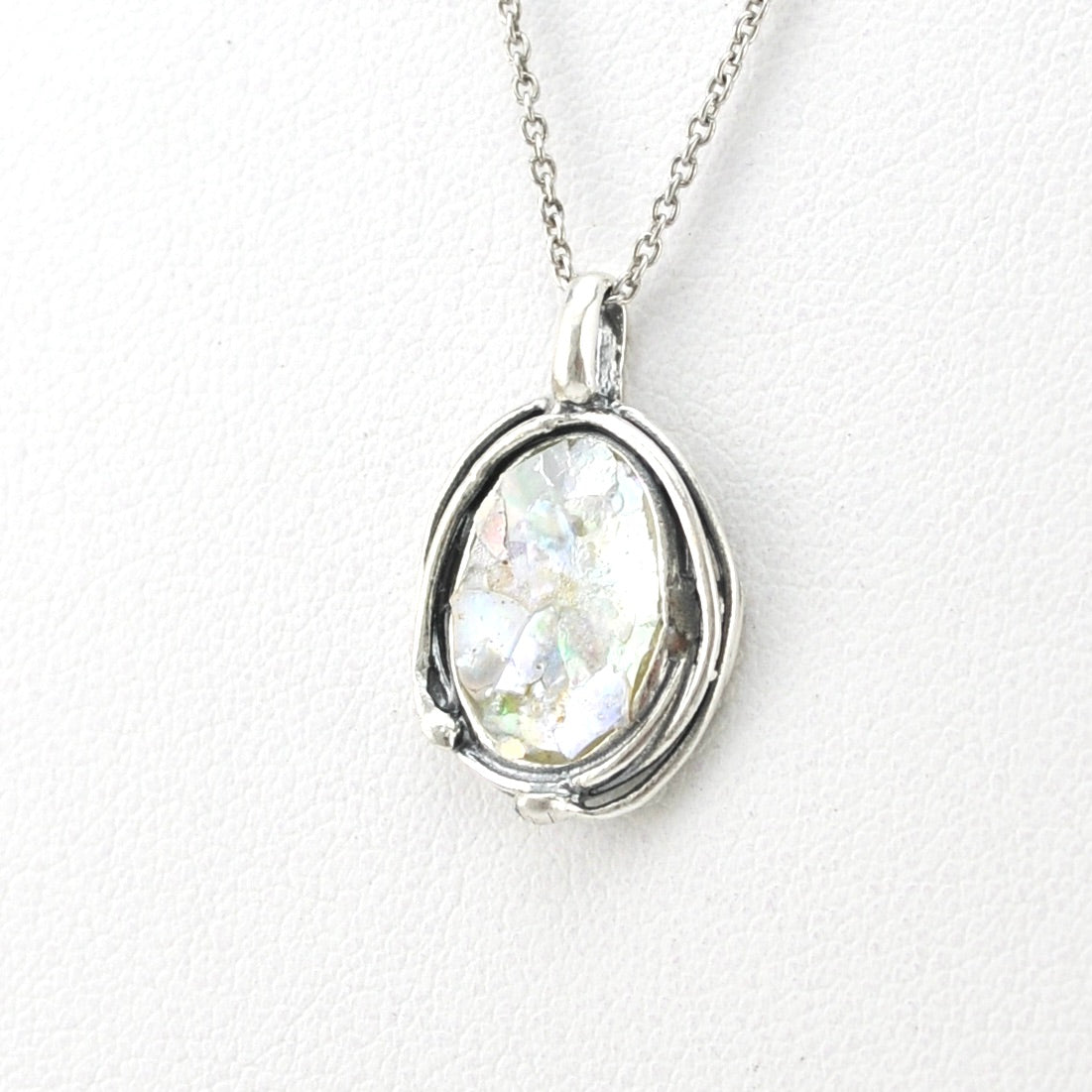 Side View Silver Roman Glass Oval Pendant