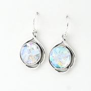 Silver earrings with round ancient glass on a white background