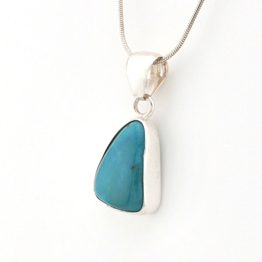 Necklace with a blue pendant on a white background