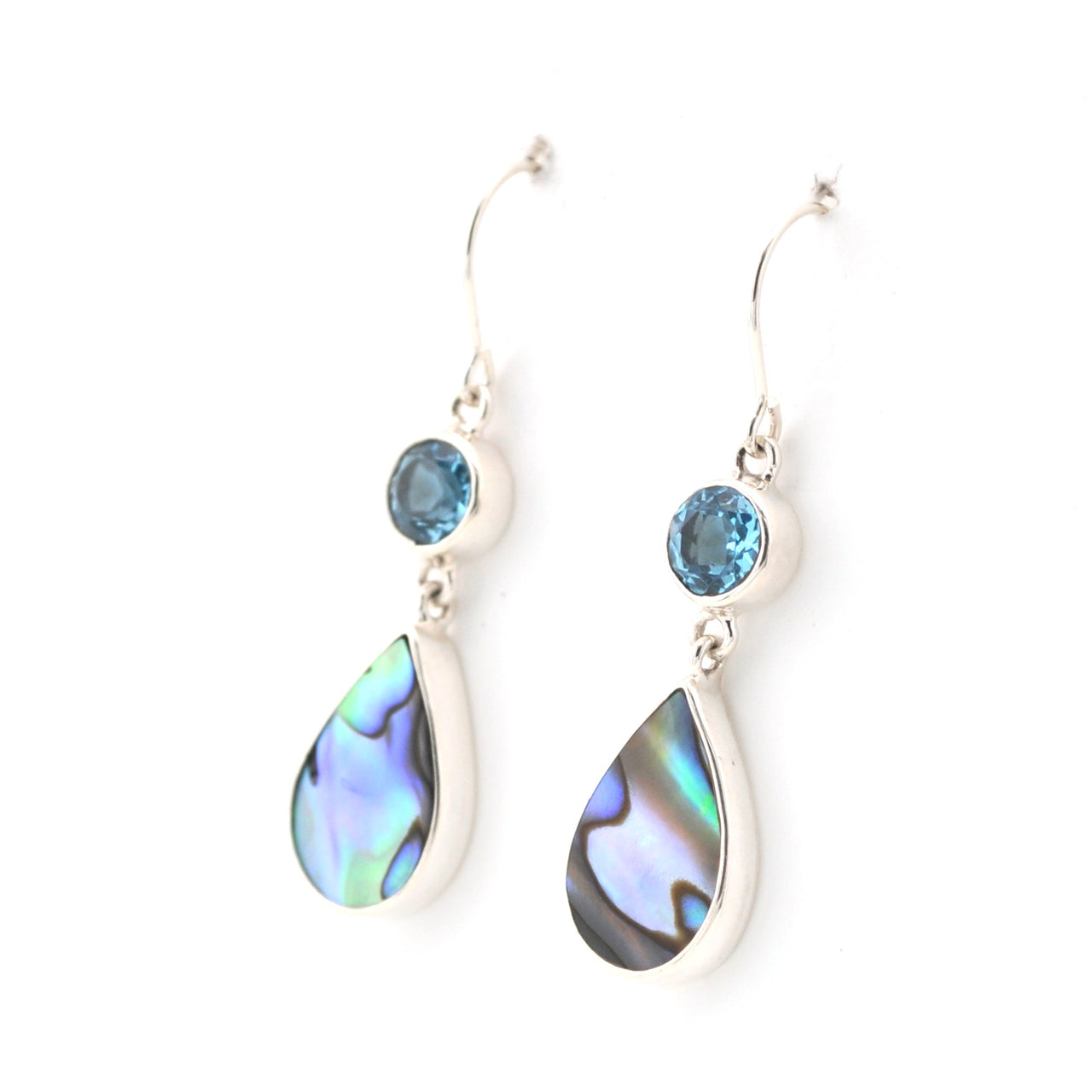 Silver earrings with teardrop-shaped gemstones on a white background