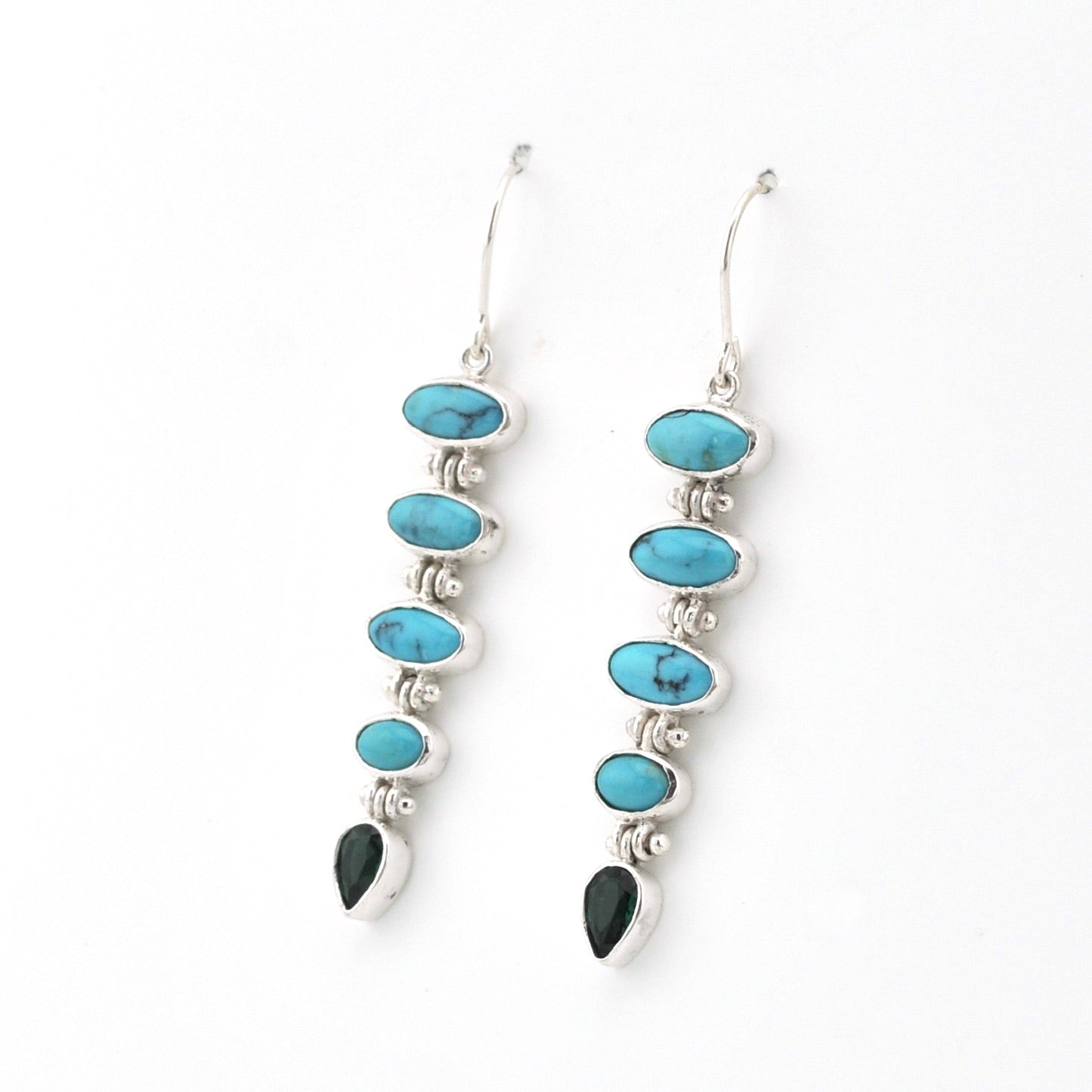 Handmade sterling silver dangle earrings featuring genuine turquoise and green quartz gemstones.