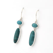 Silver Turquoise Long Oval Dangle Earrings on white background